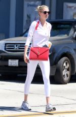 KATE UPTON Shopping at Mayfield in West Hollywood 08/19/2016