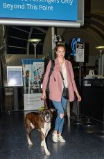 KATE UPTON with Her Dog at LAX Airport in Los Angeles 08/13/2016