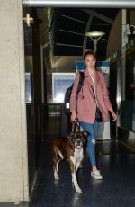 KATE UPTON with Her Dog at LAX Airport in Los Angeles 08/13/2016