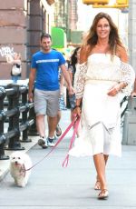 KELLY BENSIMON Walks Her Dog Out in New York 08/22/2016