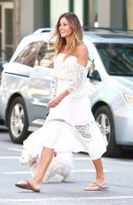 KELLY BENSIMON Walks Her Dog Out in New York 08/22/2016