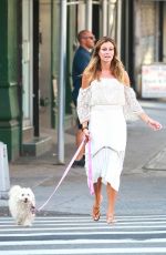 KELLY BENSIMON Walks Her Dog Out in New York 08/22/2016