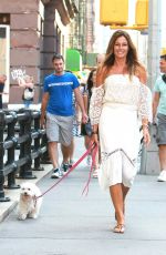 KELLY BENSIMON Walks Her Dog Out in New York 08/22/2016