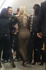 KIM KARDASHIAN at Famous by Kanye West Exhibit in Los Angeles 08/26/2016