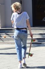 KRISTEN STEWART in Ripped Jeans Out in West Hollywood 08/18/2016