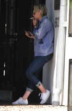 KRISTEN STEWART Smoking Outside Scott Free Production Company in West Hollywood 08/17/2016