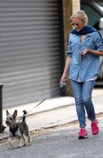 KYLIE MINOGUE Walks Her Dog Out in London 08/03/2016