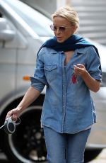 KYLIE MINOGUE Walks Her Dog Out in London 08/03/2016