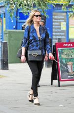 LAURA WHITMORE Out with Her Dog in London 08/13/2016