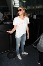 LEANN RIMES in jeans at LAX Airport in Los Angeles 08/15/2016