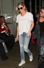 LEANN RIMES in jeans at LAX Airport in Los Angeles 08/15/2016