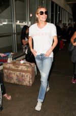 LEANN RIMES in jeans at LAX Airport in Los Angeles 08/15/2016