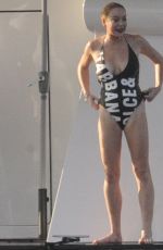 LINDSAY LOHAN in Swimsuit at a Yacht in Sardinia 07/30/2016