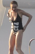 LINDSAY LOHAN in Swimsuit at a Yacht in Sardinia 07/30/2016