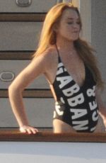 LINDSAY LOHAN in Swimsuit at a Yacht in Sardinia 07/30/2016
