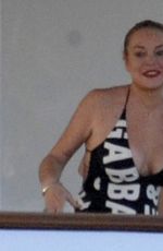 LINDSAY LOHAN in Swimsuit at a Yacht in Sardinia 07/30/2016