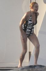 LINDSAY LOHAN in Swimsuit at a Yacht in Sardinia 07/30/2016