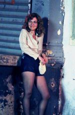 MAGGIE GYLLNHAAL on the Set of The Deuce in New York 08/04/2016
