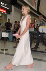 MARGOT ROBBIE Arrives at Airport in Tokyo 08/24/2016