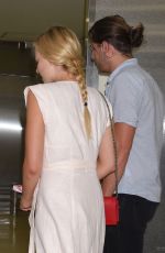 MARGOT ROBBIE Arrives at Airport in Tokyo 08/24/2016