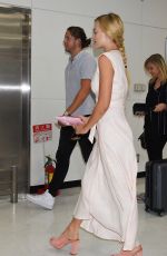 MARGOT ROBBIE Arrives at Airport in Tokyo 08/24/2016