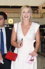 MARGOT ROBBIE Arrives at Airport in Tokyo 08/24/2016
