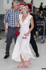 MARGOT ROBBIE Arrives at Airport in Tokyo 08/24/2016