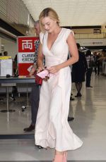 MARGOT ROBBIE Arrives at Airport in Tokyo 08/24/2016