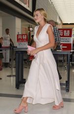 MARGOT ROBBIE Arrives at Airport in Tokyo 08/24/2016