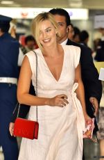MARGOT ROBBIE Arrives at Airport in Tokyo 08/24/2016