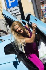 MICHELLE HUNZIKER Out at Garda Lake in Gargano 08/17/2016