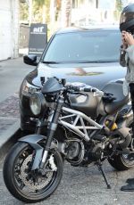 MICHELLE RODRIGUEZ Riding a Bike Out in Venice 08/28/2016