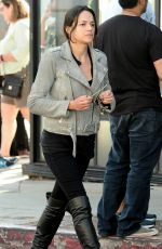 MICHELLE RODRIGUEZ Riding a Bike Out in Venice 08/28/2016