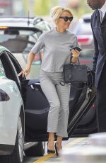 PAMELA ANDERSON Aarrives at Airport in Montreal 08/12/2016