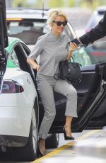 PAMELA ANDERSON Aarrives at Airport in Montreal 08/12/2016