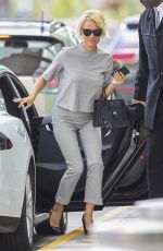 PAMELA ANDERSON Aarrives at Airport in Montreal 08/12/2016