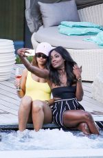 RIHANNA in Swimsuit at Pool at her Hotel in Zurich 08/13/2016