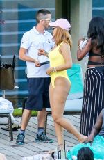 RIHANNA in Swimsuit at Pool at her Hotel in Zurich 08/13/2016
