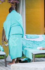 RIHANNA in Swimsuit at Pool at her Hotel in Zurich 08/13/2016