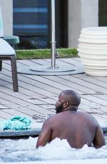 RIHANNA in Swimsuit at Pool at her Hotel in Zurich 08/13/2016