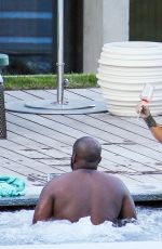 RIHANNA in Swimsuit at Pool at her Hotel in Zurich 08/13/2016