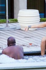 RIHANNA in Swimsuit at Pool at her Hotel in Zurich 08/13/2016
