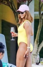 RIHANNA in Swimsuit at Pool at her Hotel in Zurich 08/13/2016