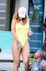 RIHANNA in Swimsuit at Pool at her Hotel in Zurich 08/13/2016