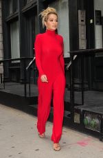 RITA ORA All in Red Leaves Her Apartment in NewYork 10/08/2016