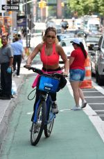 RITA ORA Rding a Bike Out in New York 08/03/2016