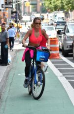 RITA ORA Rding a Bike Out in New York 08/03/2016