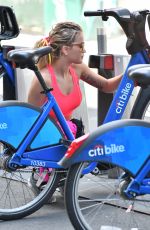 RITA ORA Rding a Bike Out in New York 08/03/2016