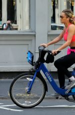 RITA ORA Rding a Bike Out in New York 08/03/2016