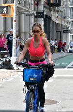 RITA ORA Rding a Bike Out in New York 08/03/2016